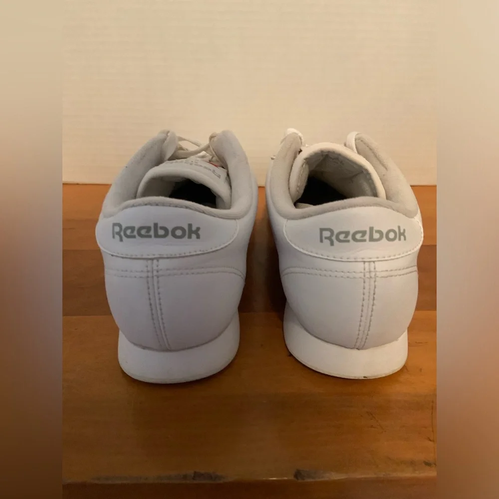 Reebok Classic White Athletic Shoes with Red Logo